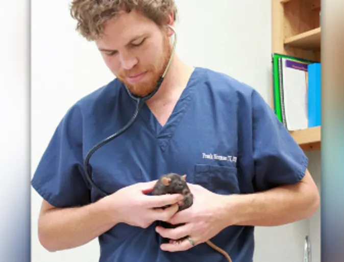 Dr.Shuman Holding a Mouse